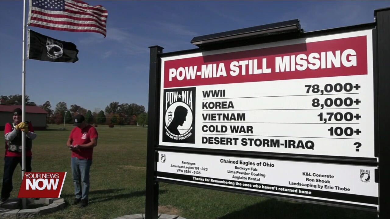 Chained Eagles of Ohio replaces MIA-POW sign and puts up flagpole on Conant Road